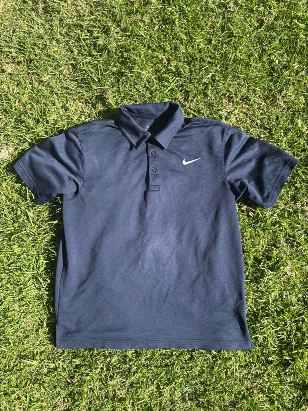 Nike Navy Polo Shirt with White Swoosh
